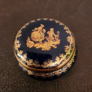 Vintage Limoges France Porcelain Trinket is a small round box